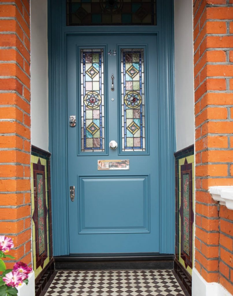 Wood front doors with stained glass