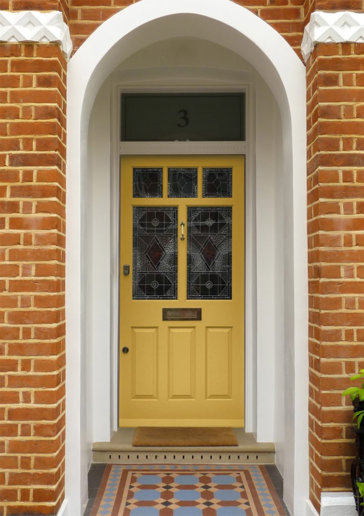Yellow 5 panel Edwardian front door.