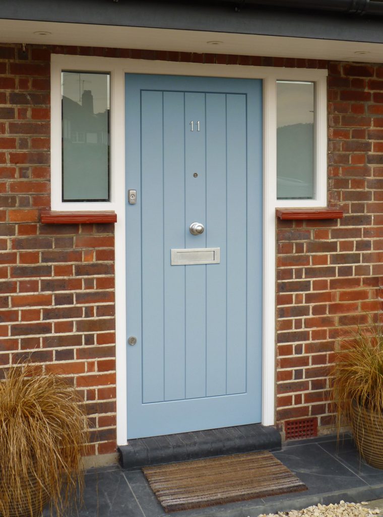 Seaside Blue Contemporary front door with silver hardware