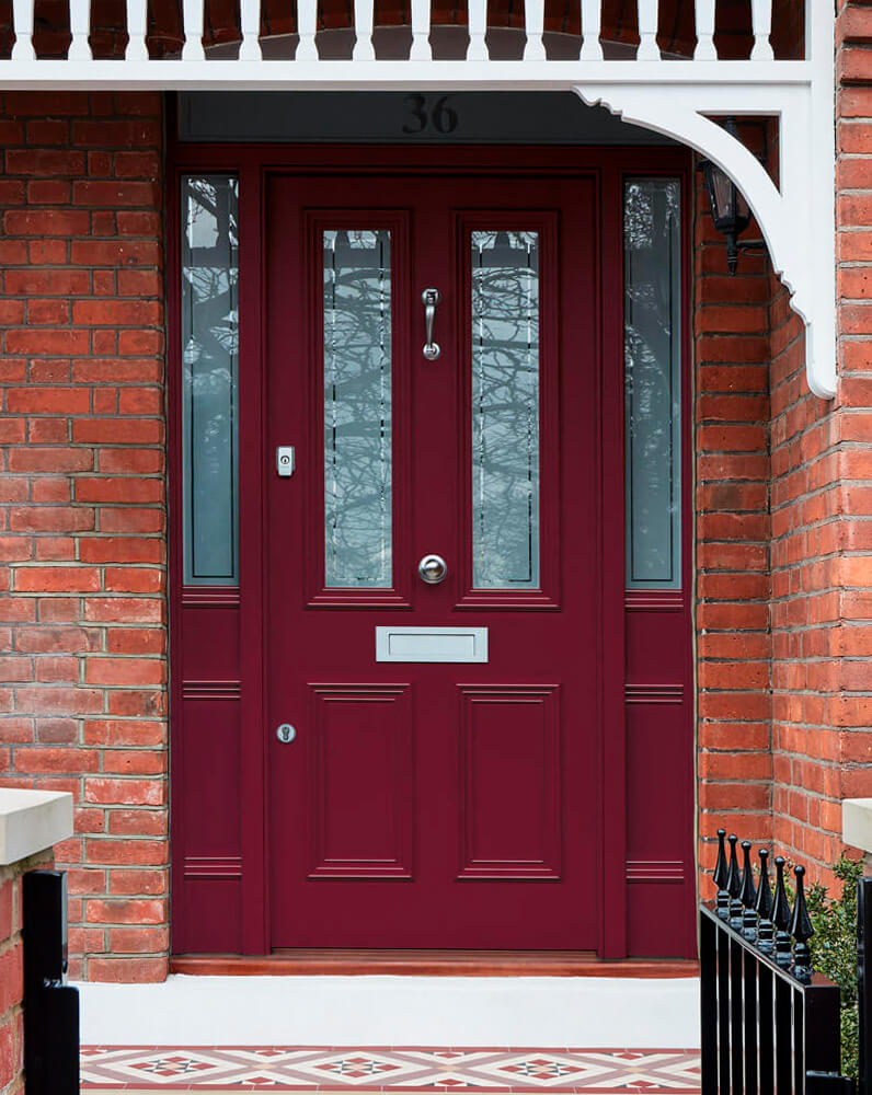 Elegant black and red front doors, Greater London, England, UK